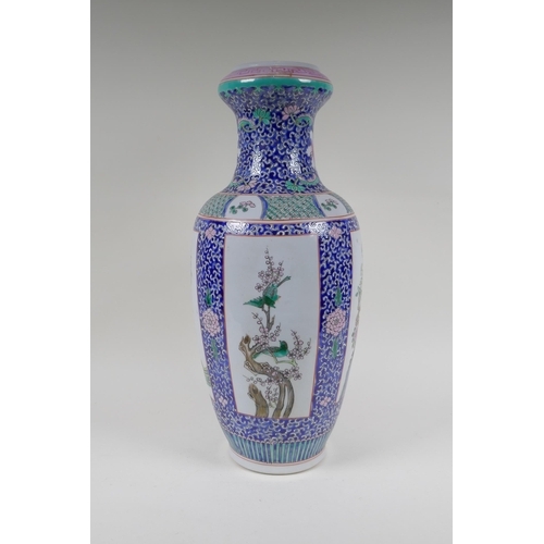 143 - A famille rose porcelain vase, with decorative panels depicting asiatic birds amongst flowers, Chine... 