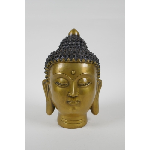 145 - A Chinese filled head bust of Buddha, character mark to base, 22cm high