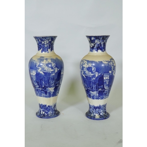 168 - Pair of Wedgwood Etruria 'Ferrara' blue and white vases, impressed and stamped to base, 38cm high