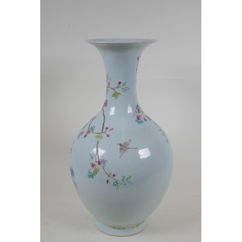 218 - A Chinese famille rose porcelain vase decorated with birds amongst branches, KangXi 6 character mark... 