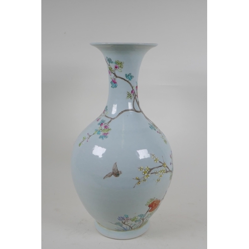 218 - A Chinese famille rose porcelain vase decorated with birds amongst branches, KangXi 6 character mark... 