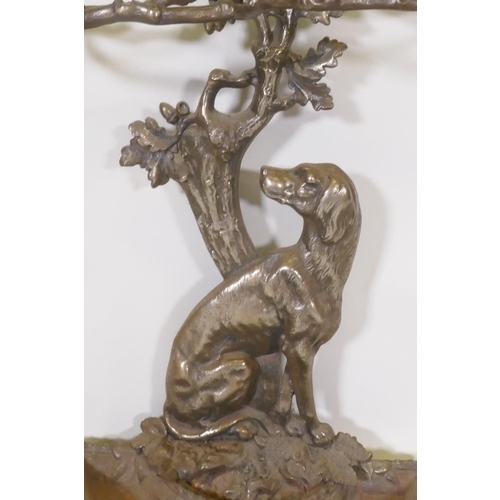 1119 - A Victorian style cast iron stick stand in the form of a seated dog with the legend Cave Canem, 75cm... 