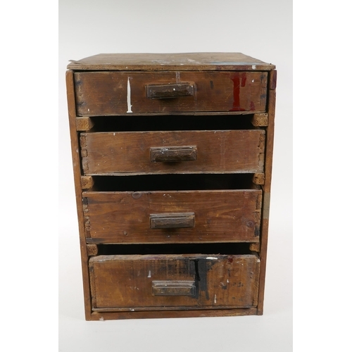 1104 - A rustic workshop tool chest of four drawers, 33cm x 36cm, 46cm high