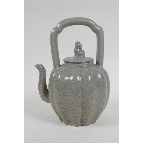 226 - A Chinese celadon crackleware teapot in the form of a gourd, 22cm high