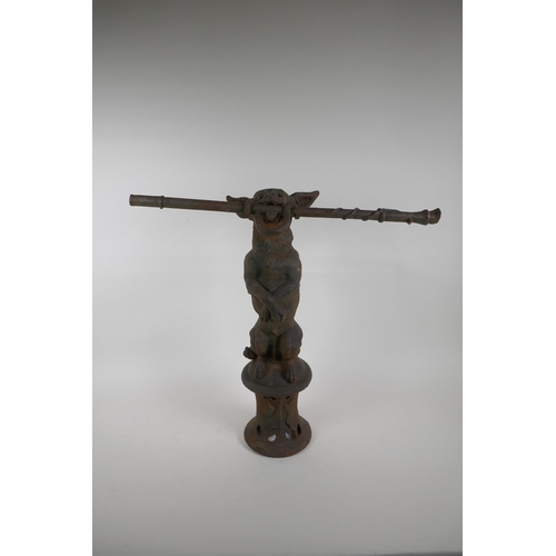 1088 - A Victorian cast iron stick stand formed as a dog on its hind legs, after Coalbrookdale, losses, 55c... 