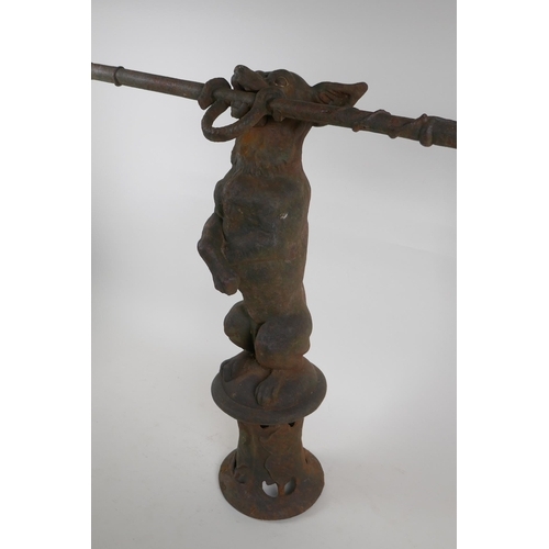 1088 - A Victorian cast iron stick stand formed as a dog on its hind legs, after Coalbrookdale, losses, 55c... 