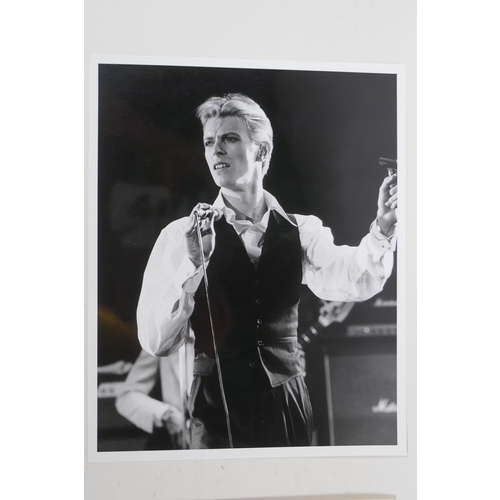 237 - Four 1970s black and white press photographs of David Bowie, all with London Features International ... 