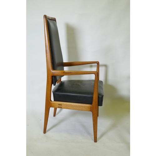 1059 - A set of three mid century teak boardroom elbow chairs with leather upholstered seats and backs