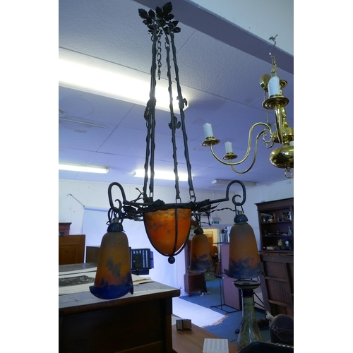 1049 - An early C20th French Muller Freres Luneville painted wrought iron and glass chandelier, 1 shade rep... 