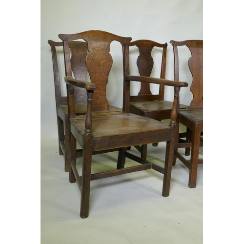 1039 - A set of six (4+2) provincial elm Chippendale style dining chairs with pegged joints and blacksmith ... 