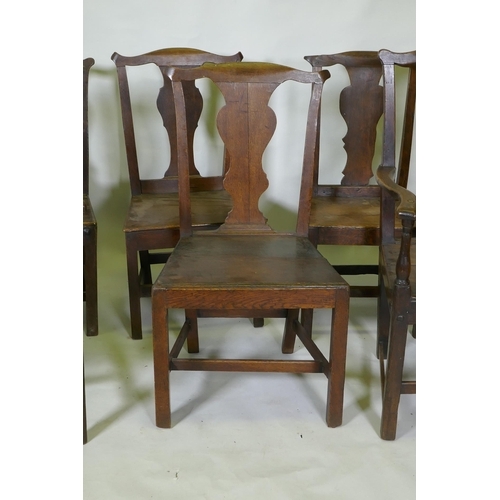 1039 - A set of six (4+2) provincial elm Chippendale style dining chairs with pegged joints and blacksmith ... 