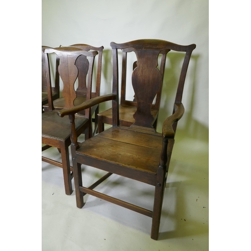 1039 - A set of six (4+2) provincial elm Chippendale style dining chairs with pegged joints and blacksmith ... 