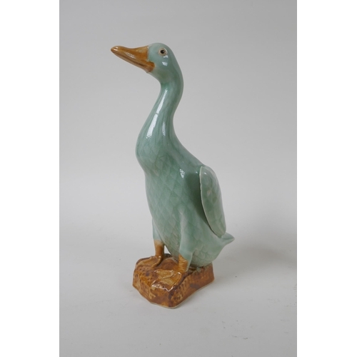 261 - A pair of Chinese celadon glazed porcelain ducks with impressed seal mark to base, and another small... 