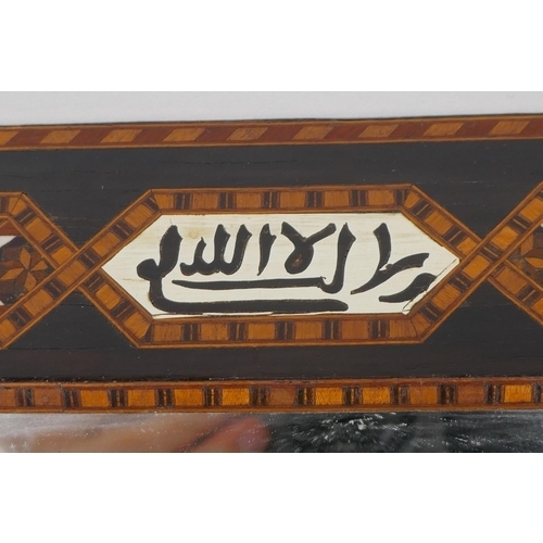 1025 - An antique Islamic marquetry inlaid mirror with script decoration, 30 x 43cm