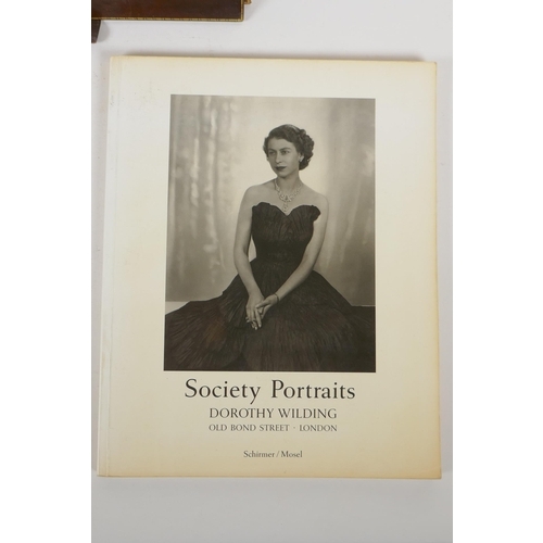 266 - A Dorothy Wilding portrait photograph in a leather photograph wallet, together with the book In Purs... 