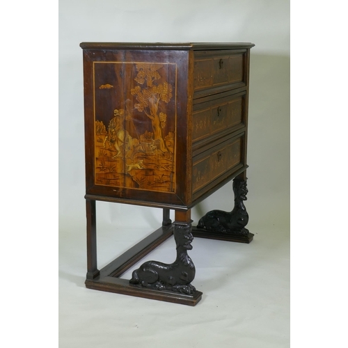 1018 - C18th/C19th Italian/Swiss marquetry inlaid walnut chest of three drawers, inlaid with hunting scenes... 