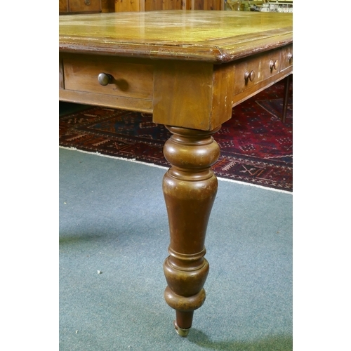 1005 - A large C19th eight drawer mahogany partners library table/desk, with leather inset top, raised on t... 