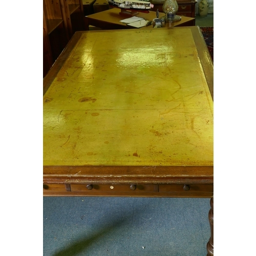 1005 - A large C19th eight drawer mahogany partners library table/desk, with leather inset top, raised on t... 