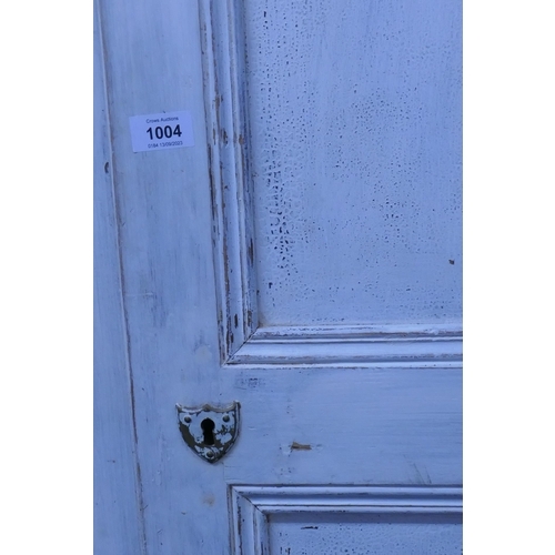 1004 - A C19th French painted pine 'knock down' armoire with two panelled doors, 150 x 59 x 224cm