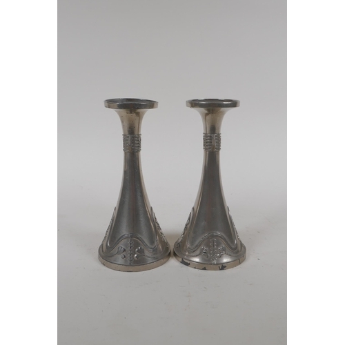 283 - A pair of Jugendstil white metal spill vases, 15cm high