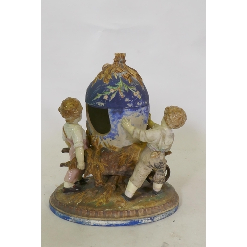 286 - C19th Majolica ceramic centrepiece in the form of three boys with a wheelbarrow, AF, 36cm high