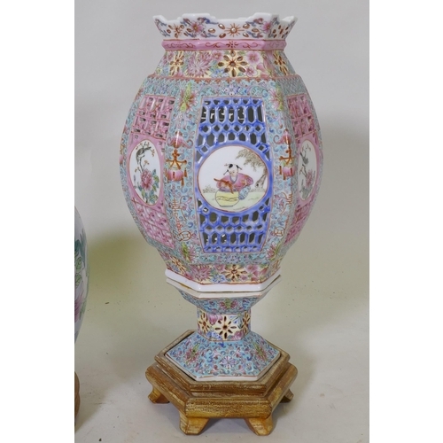 299 - A vintage Chinese porcelain lamp with pierced sleeve and polychrome decoration, and a jar and cover