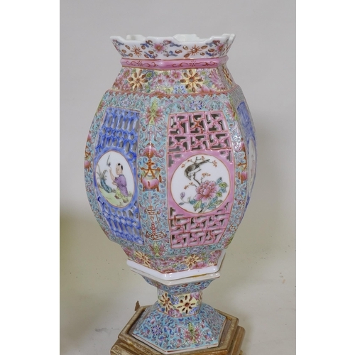 299 - A vintage Chinese porcelain lamp with pierced sleeve and polychrome decoration, and a jar and cover