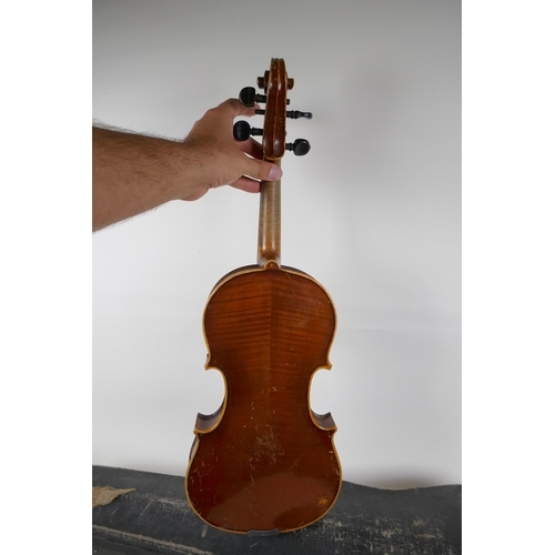 300 - A violin and bow, the neck of the violin stamped RMB 1206, in a carry case, violin 59cm long