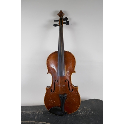 300 - A violin and bow, the neck of the violin stamped RMB 1206, in a carry case, violin 59cm long