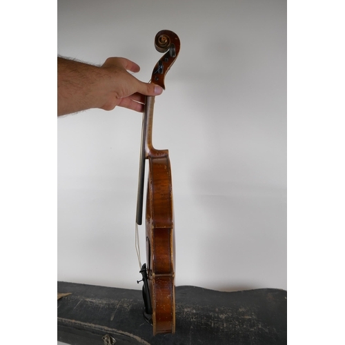 300 - A violin and bow, the neck of the violin stamped RMB 1206, in a carry case, violin 59cm long