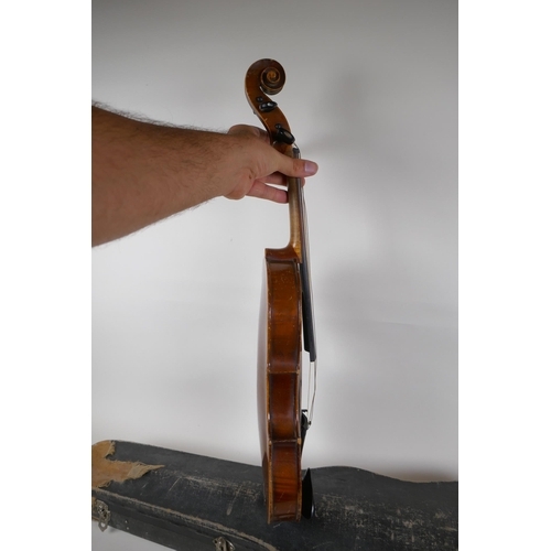 300 - A violin and bow, the neck of the violin stamped RMB 1206, in a carry case, violin 59cm long