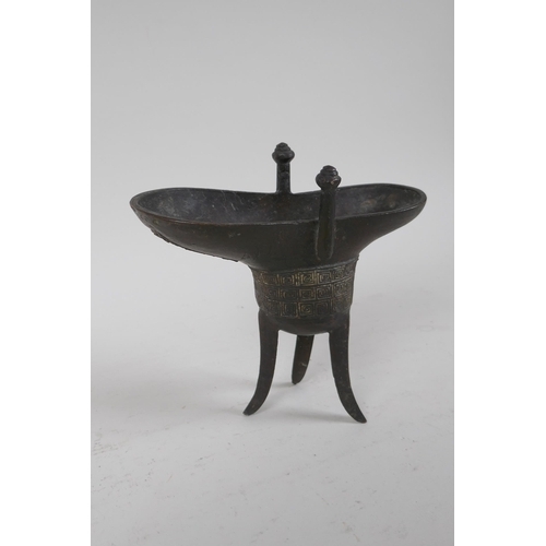 312 - An antique Chinese bronze jue, 15cm high, AF