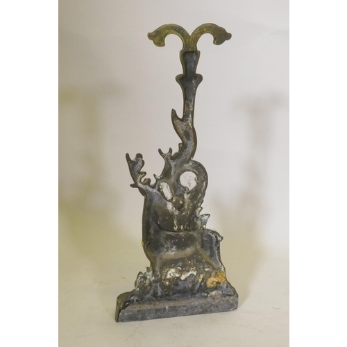 325 - A Victorian brass door stop in the form of a stag, 41cm high