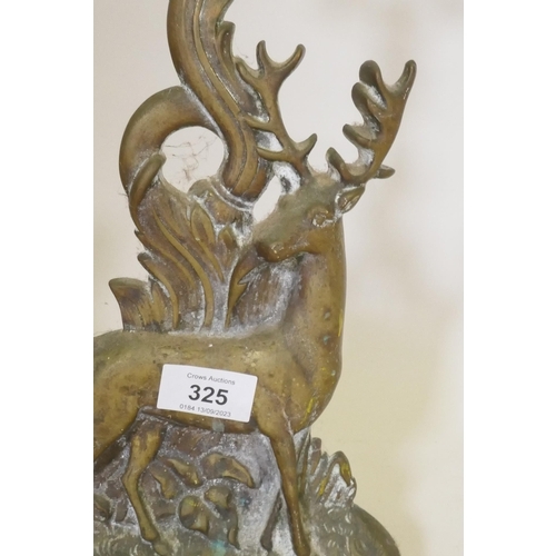 325 - A Victorian brass door stop in the form of a stag, 41cm high