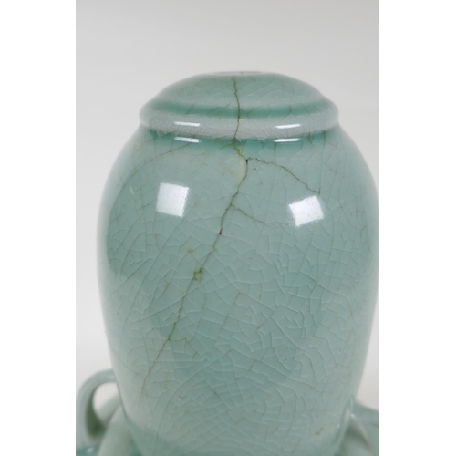 337 - An oriental celadon crackle glazed porcelain gourd with two handles, 34cm high, hairline cracks