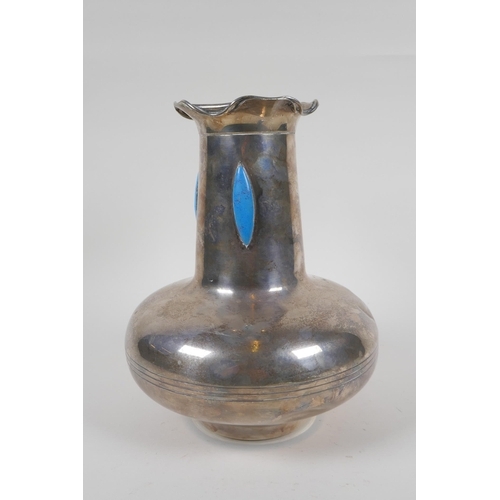 602 - An Art Nouveau white metal vase with lobed rim and set with turquoise style cabochons, 25cm high