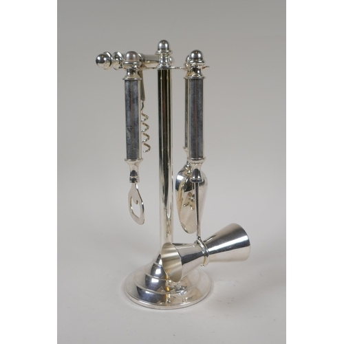 622 - A silver plated bar tool companion set, 27cm high