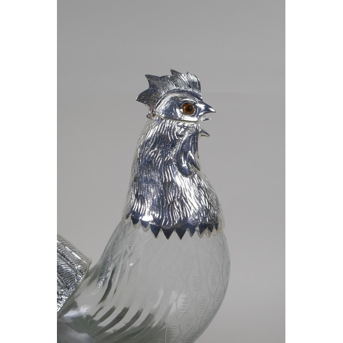 631 - A silver plate and cut glass cockerel decanter, 34cm high