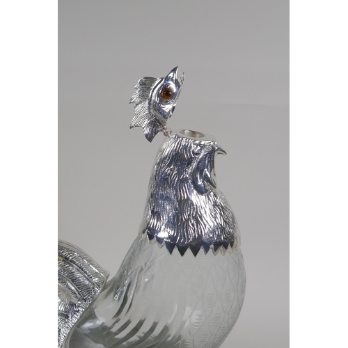 631 - A silver plate and cut glass cockerel decanter, 34cm high