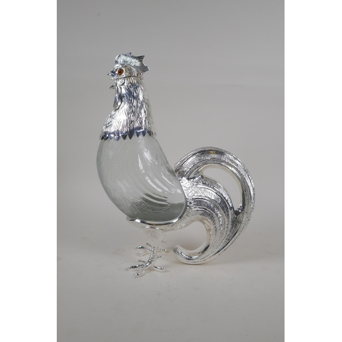 631 - A silver plate and cut glass cockerel decanter, 34cm high