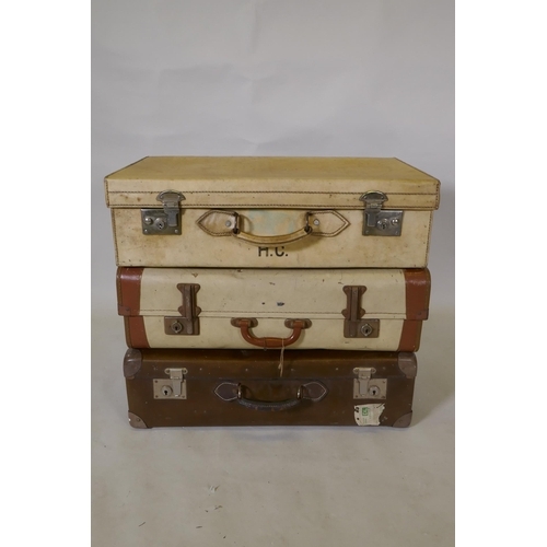 296 - A 1940s pigskin suitcase and two vintage cases, 67 x 39cm, 19cm high