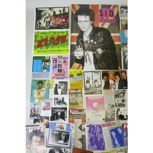 239 - A quantity of punk ephemera to include press photos, flyers, zines, badges etc, including Buzzcocks,... 