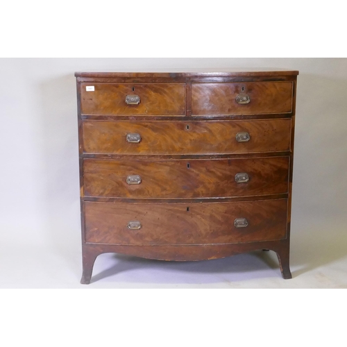 1121 - A Georgian mahogany bowfront chest of two over three drawers with cock beaded detail and brass plate... 