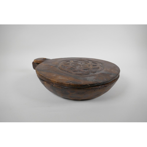 262 - An African antique carved hardwood Kalimba in the form of a figure, together with a carved root wood... 