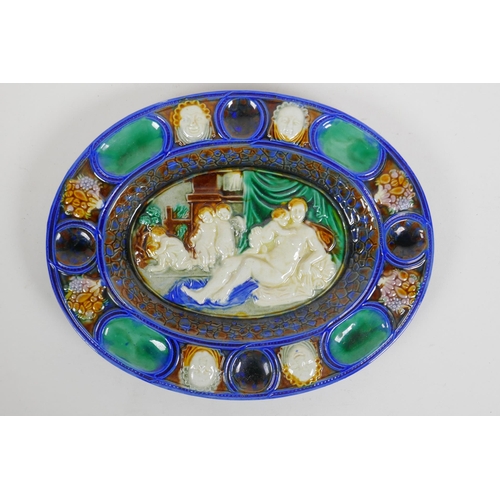 281 - In the manner of Bernard Palissy, an oval shaped ceramic dish with moulded decoration of an allegory... 