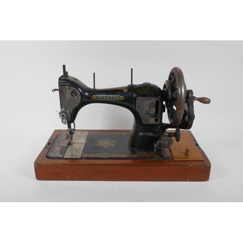 305 - A vintage Hexagon handcrank sewing machine, manufactured by the Standard Sewing Machine Co, Clevelan... 