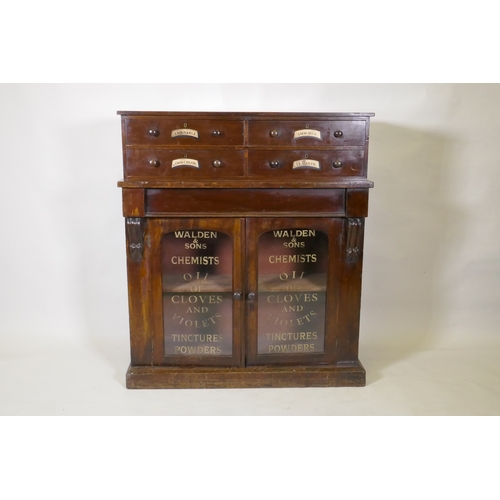 1012 - A C19th mahogany side cabinet, with four upper drawers over one frieze drawer and two glazed doors, ... 