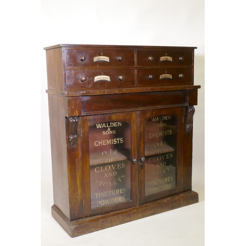 1012 - A C19th mahogany side cabinet, with four upper drawers over one frieze drawer and two glazed doors, ... 