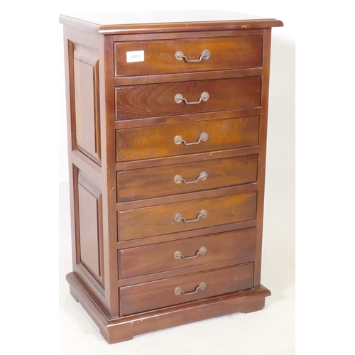 1013 - A small hardwood seven drawer semainier chest, with brass drop handles, 44 x 30 x 73