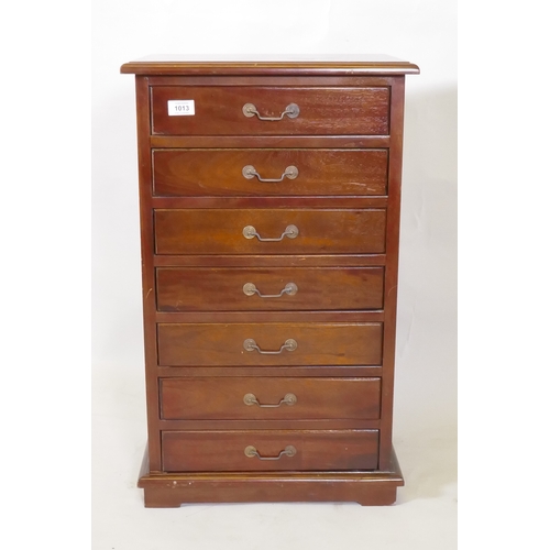 1013 - A small hardwood seven drawer semainier chest, with brass drop handles, 44 x 30 x 73